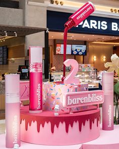 a pink display in front of a store