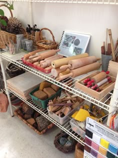 the shelves are filled with different types of craft supplies