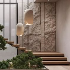 the interior of a house with stone walls and wooden steps leading up to an indoor tree