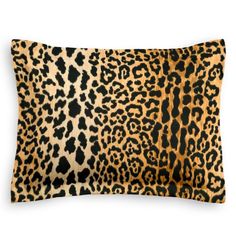 an animal print pillow on a white background