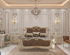 an elegant bedroom with white walls and gold accents