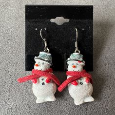 Snowman Dangle Earrings Snowman Shaped Earrings Lightweight Material Silver Colored Unknown Metal Fishhook Backings Brand New Without Tags Excellent Condition Smoke Free Home **I Accept Reasonable Offers. Same Day Or Next Day Shipping. Thank You For Stopping By My Closet. I Hope You Have A Wonderful Day!! ** ** New To Poshmark? Sign Up With My Code: Happy_closet_sc And Get $10** Have A Wonderful Day, Wonderful Day, Fish Hook, Silver Color, Red White, Red And White, Dangle Earrings, Handmade Jewelry, Jewelry Earrings