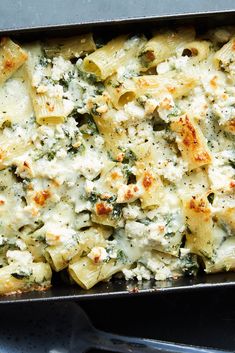 a casserole dish with broccoli and cheese