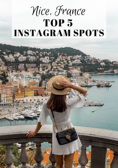 a woman standing on top of a balcony next to the ocean with text overlay reading, nice france top 5 instagram spots