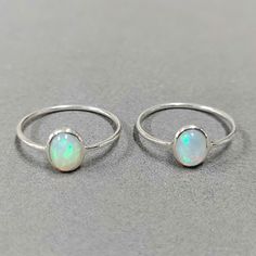 - PRODUCT TYPE - 925 SILVER OPAL SIMPLE RING - MATERIAL - SILVER - PURITY - 925 - TOTAL WEIGHT - 0.635 GRAMS - STONE WEIGHT - 0.55 CARATS - SILVER WEIGHT - 0.525 GRAMS Minimal & Simple, Dainty Handmade Bands.Understated Luxury. - Delicate Handmade Silver Ring. - Made to order, just for you. Anirudh Gems Store :- https://www.etsy.com/uk/shop/ANIRUDHGEMSStore?ref=search_shop_redirect -Quality is guaranteed. Our mission is always to satisfy our customers with our offerings, so just relax and pl Silver Minimalist Opal Rings, Minimalist Silver Opal Ring, Silver Ethiopian Opal Rings As A Gift, Handmade Silver Rings With Ethiopian Opal, Silver Ethiopian Opal Ring For Promise, Silver Opal Ring With Oval Cabochon, Silver Ethiopian Opal Promise Ring, Handmade Silver Ethiopian Opal Rings, Fine Jewelry Silver Rings With Ethiopian Opal