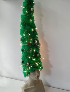 "A Christmas Tree on a wig! You can either wear it or use it for decoration. It is 39\" inches tall (99cm from neck to the top of the head) but well balanced so you can wear it easily. The base is elastic so it fits perfectly without restricting your movement while it is not heavy so it is comfortable wearing it. It has a metal wire inside and it is filled with cloth in order to keep its upright position. The base can be larger, looser, deeper, or tighter according to your needs. It practically Fake Mustaches, Gibson Girl, Wig Making, Costume Hats, Very Long Hair, Metal Wire, Great Artists, Costume Accessories, The Head