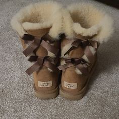 These Are A Pair Of Size 9 Ugg Bailey Boot 2 Edition, With A Brown Color. They Have Only Been Worn A Few Times. Cleaning Care Kit Is Included In The Price And Has Barely Been Used! If You Would Not Like To Buy The Cleaning Care Kit, I Am Willing To Negotiate A Cheaper Price For The Boots Alone. Chestnut Ugg Boots, Ugg Boots With Bows, Sequin Ugg Boots, Ugg Bailey Boots, Cute Uggs, Clear Boots, Ugg Bailey Bow, Black Ugg Boots, Bailey Bow Uggs