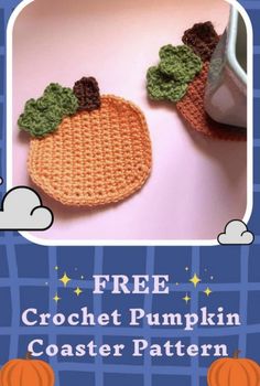 two crocheted pumpkin coasters sitting next to each other on a pink surface