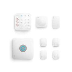 the home security system is white and includes several electronic devices