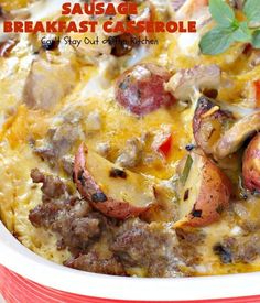 sausage breakfast casserole in a red and white dish