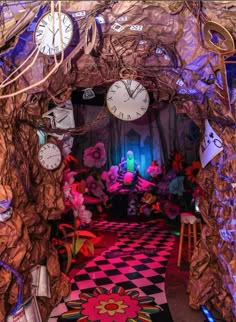 an image of a room with clocks on the wall and carpeted floor in front of it