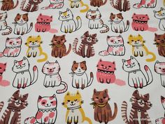 a white background with many cats on it