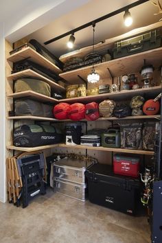 an organized closet with many items on shelves