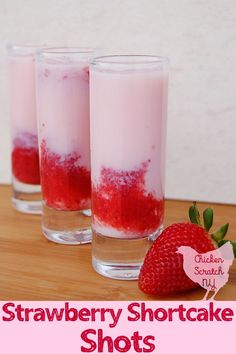 strawberry shortcake shots in glasses with strawberries on the side and text overlay that reads strawberry shortcake shots