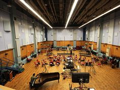 an empty concert hall filled with musical instruments