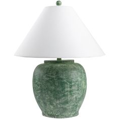 a green ceramic lamp with a white shade on the base and a white linen lampshade