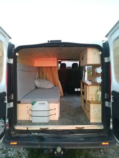 the back end of a van with its doors open