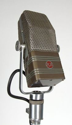 an old fashioned microphone on a tripod