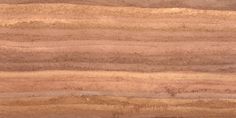 a close up view of some brown and tan wood