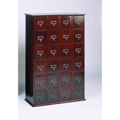 a large wooden cabinet with many drawers