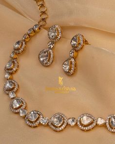 Be the bedazzling beauty in our Polki Necklace with Earrings Set ,14 Karat Hallmarked Gold Priced - Rs. 4,22,000 Note : Prices may vary as per daily gold rate Making charges 8% 3% GST 100% buy back cash / exchange Shipping pan India DM for more queries or visit us at : RAMA KRISHNA JEWELLERS PVT LTD D-34 Lajpat Nagar 2 , Central Market, New Delhi -110024 #jewellery #jewellerydesign #designerjewellery #jewellerylover #goldjewellery #goldantiquejewellery #diamond #diamondjewellery #onlines Polki Tops, Jewellery Design Gold, Necklace With Earrings Set, Latest Gold Jewellery, Rama Krishna, Necklace Styles, Fancy Diamond Ring, Antique Necklaces Design, Diamond Bracelet Design