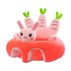 an inflatable toy with two bugs sitting on it