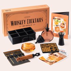 an assortment of cocktails and other items are shown in this box with the contents