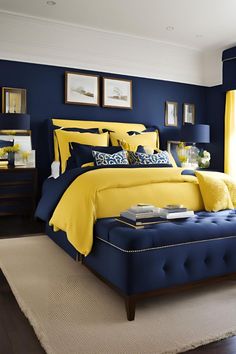 a bedroom with blue walls and yellow bedding in the center, along with white rugs