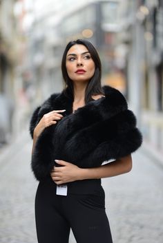 Elevate your elegance and warmth with our exquisite Black Fox Fur Shawl Wrap. Crafted to perfection, this luxurious accessory is the ideal companion for your special occasions, especially weddings. 🖤 **Black Elegance The deep, rich black color of this shawl adds a touch of sophistication to any outfit. Whether you're the bride or a guest, it complements your attire beautifully. 🔥 **Exceptional Warmth As temperatures drop, our fox fur shawl wrap provides exceptional warmth. It's designed to kee Black Elegance, Black Fox, Fur Accessories, Fur Shawl, Wedding Shawl, Winter Weddings, Shawl Wrap, Fox Fur, Soft Texture