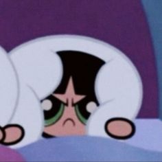 an animated image of a woman in bed with her head under the covers and eyes closed