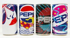 six cans of pepsi are lined up in a row