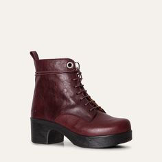 Jonna Plum Booties | Jonna Collection | Trendy Women's Boots | Classic Boot Style | Fall Fashion | Chunky heel boots | Handmade shoe | Gift| The Jonna lace-up boot in soft Plum leather makes a chic statement. The boot features a low, chunky clog-style heel in contrasting black and a pull-tab for easy wear. The removable anatomical sole provides optimal support, while our unique flexible sole means the Jonna boot can be worn comfortably all day long.  Handmade in Portugal Unique Calou sole, soft Chunky Heel Boots, Womens Booties, Clogs Style, Booties Ankle Boots, Chunky Heels Boots, Boot Style, Classic Boots, Slipper Shoes, Handmade Shoes