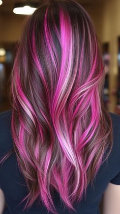 Elevate your style with raspberry pink streaks that pop against tan skin. Visit our page for tips on achieving this bold look. Save this pin for streak inspiration! Tags: #RaspberryPinkStreaks #HairColor #TanSkin Brown Hair With Pink Streaks, Hair With Pink Streaks, Unusual Hairstyles, Brown Hair With Pink, Metallic Hair Dye, Pink Hair Highlights, Pink Hair Ideas