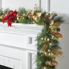 a decorated fireplace mantel with christmas decorations