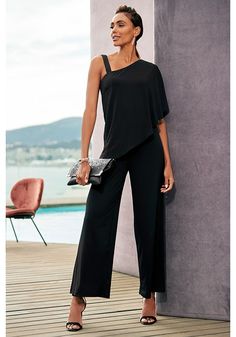 Elevate your style with this fashion-forward jumpsuit that adds a layer of sophistication to any look. Sleek Summer Jumpsuits And Rompers For Formal Occasions, Sleek Formal Jumpsuits And Rompers For Summer, Sleek Summer Formal Jumpsuits And Rompers, Black Summer Pantsuit For Going Out, Sleek Summer Party Jumpsuits And Rompers, Elegant Strapless Jumpsuit For Summer Outings, Elegant Strapless Jumpsuit For Going Out In Summer, Elegant Strapless Jumpsuit For Summer Going Out, Elegant Strapless Jumpsuit For Summer