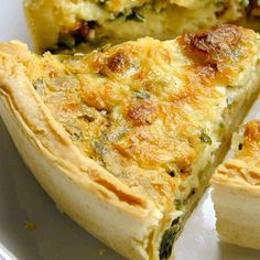 a quiche on a white plate with the words northwest salmon quiche above it