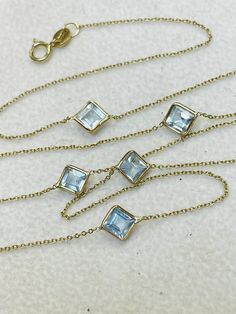 The necklace features 5 natural aquamarines with a square step cut, each .45 carats, set on a cable chain. These are natural and earth mined aquamarines in solid 14K yellow gold. Each aqua is set 2.5" apart. 19.5" long marked 14K Adjustments or custom orders can be made by request. Step Cut, Gold Collar, Aqua Marine, Natural Aquamarine, Pin Board, Last Minute Gifts, Cable Chain, Pendant Necklaces, Aquamarine