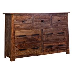 a wooden dresser with several drawers on it