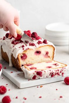 Full of sweet fruity flavor with just a touch of floral aroma, this Raspberry Rose Yogurt Loaf Cake is great for Valentine’s Day, or any occasion! This Raspberry Rose Yogurt Loaf Cake comes together rather quickly, and is packed with sweet, fresh raspberries throughout! This loaf cake utilizes yogurt in the batter, adding a delicious tangy taste, that pairs wonderfully with the raspberries! Rosewater is added both to the cake batter and to the glaze, providing a delicate floral overtone!