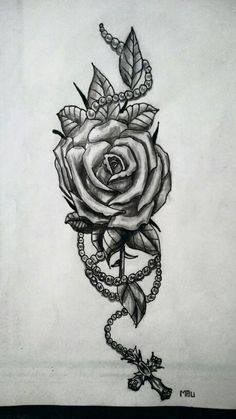 a drawing of a rose with rosary and leaves