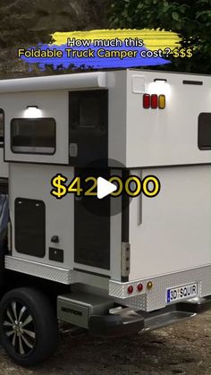 a truck with a camper trailer attached to it's back and the words $ 42, 000 below