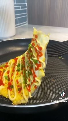 a slice of pizza sitting on top of a pan covered in cheese and toppings