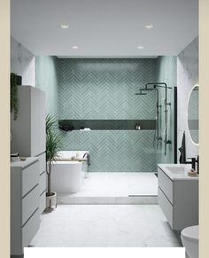 a bathroom with green and white tiles on the walls