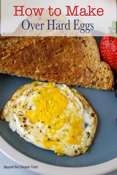 an egg and toast on a plate with strawberries