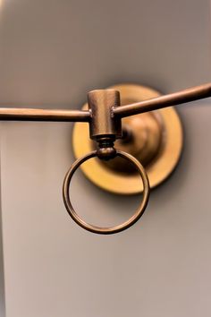 a close up of a light fixture with a ring on it