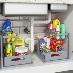 two bins filled with cleaning products under a sink