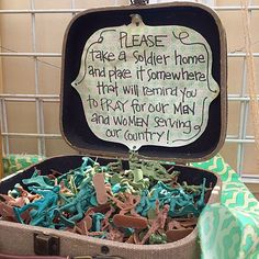 an open suitcase filled with lots of different types of letters and writing on the lid