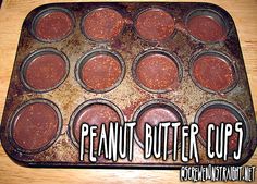 chocolate cupcakes in a muffin tin with the words peanut butter cups