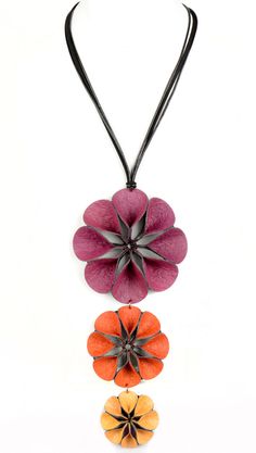 Mixed-Media Necklace - Hand-sculpted flowers are the centerpiece of this large, dimensional statement necklace. This hand-painted design is made from recycled coconut husks which is sustainably made, eco-friendly, and waterproof. Comes on a 1 adjustable leather and suede rope neck with a lobster clasp closure. Leather Necklace Diy, Felt Flower Necklace, Sculpted Flowers, Leather Statement Necklace, Zipper Flowers, Mixed Media Necklace, Artsy Jewelry, Coconut Husk, Felt Flowers Diy