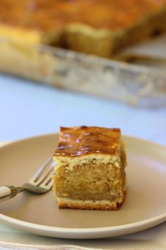 a piece of cake on a plate with a fork